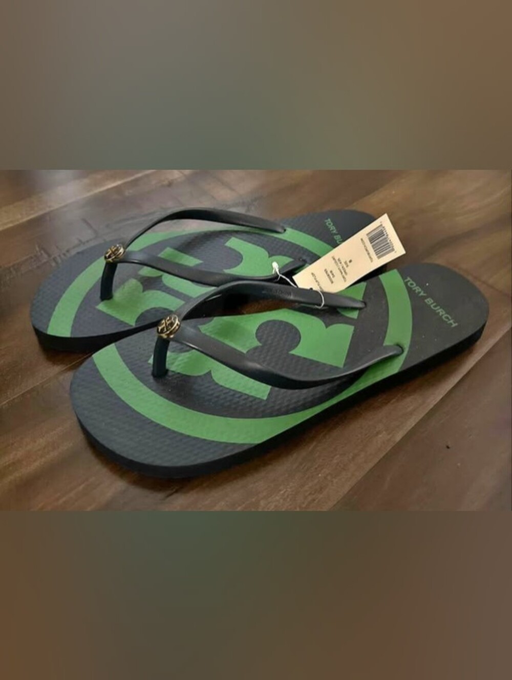 Tory Burch Black Flip Flops with Green Logo and Gold Hardware